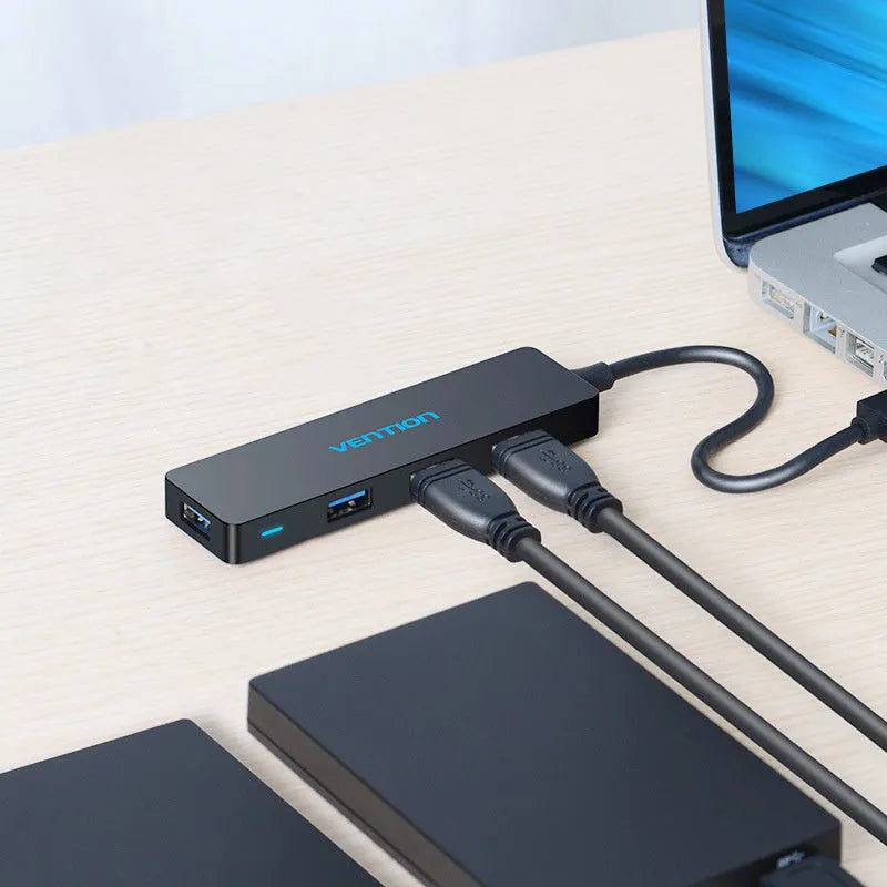Black USB 3.0 hub with four ports, 0.15m cable, and nickel-plated connectors