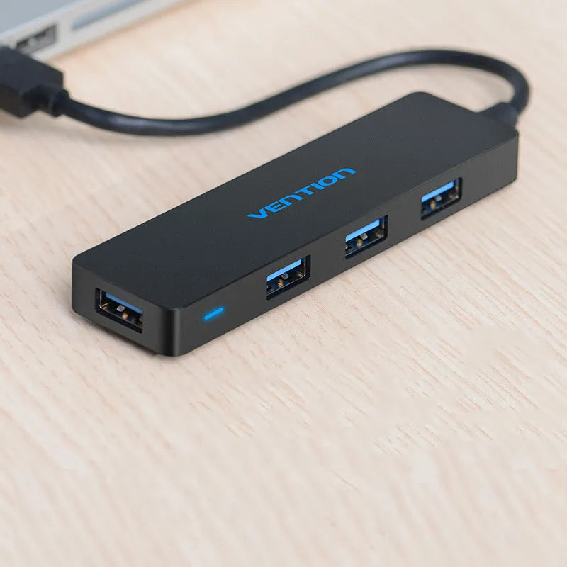 Black USB 3.0 hub with four ports, 0.15m cable, and nickel-plated connectors