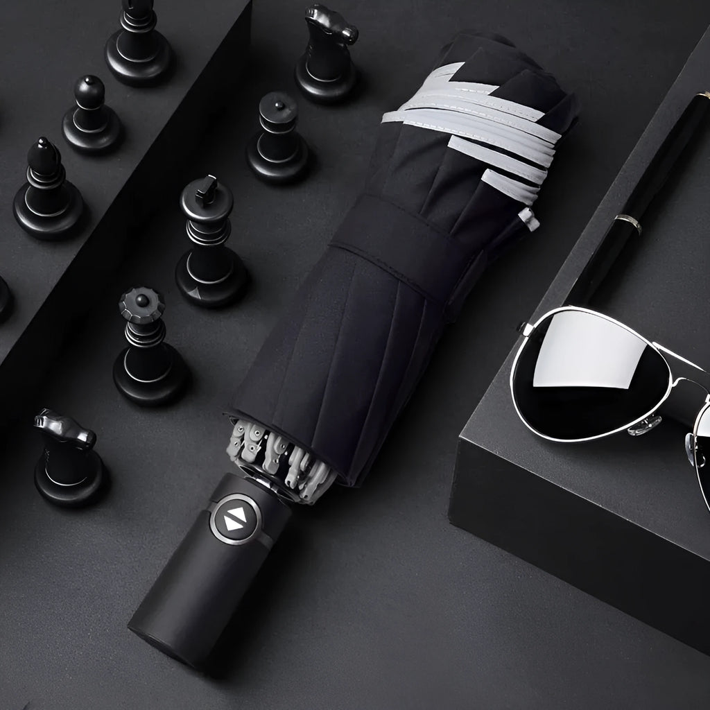 Automatic reverse umbrella showing black canopy with 10 ribs and plastic non-slip handle