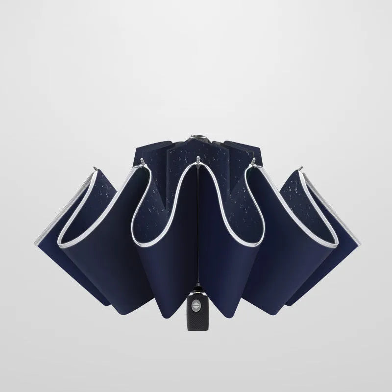 Automatic reverse umbrella showing black canopy with 10 ribs and plastic non-slip handle