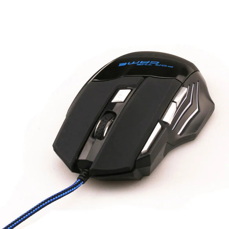 Betas 7-button colourful glowing wired USB gaming mouse on a desk