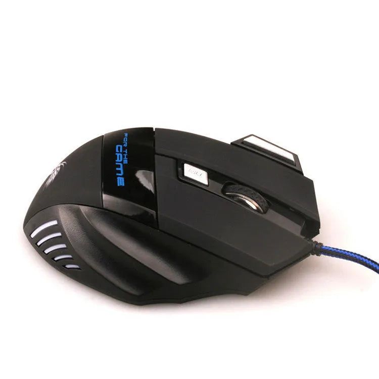 Betas 7-button colourful glowing wired USB gaming mouse on a desk