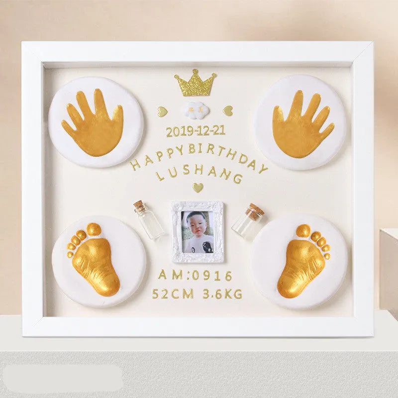 Modern DIY baby hand and foot print photo frame with digital display post and warm light, in black, pink, or white finish.