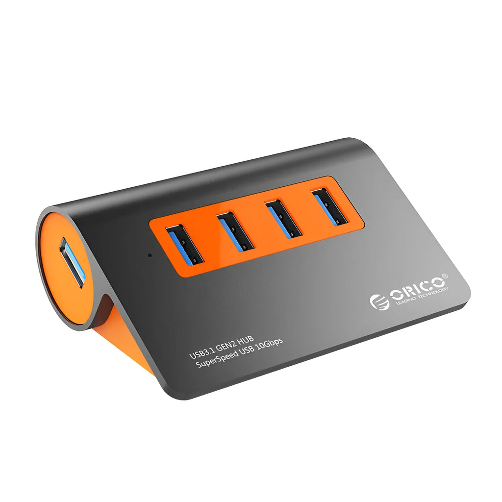 Dark grey aluminium USB hub with orange accents showing four USB 3.1 ports and separate data cable