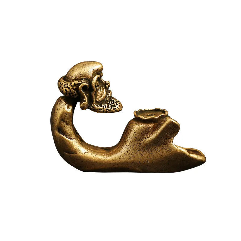 Brass tea pet ornaments with classical styling measuring 60cm wide