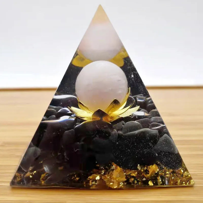 Black resin pyramid ornament measuring 60 x 60 mm on a white background