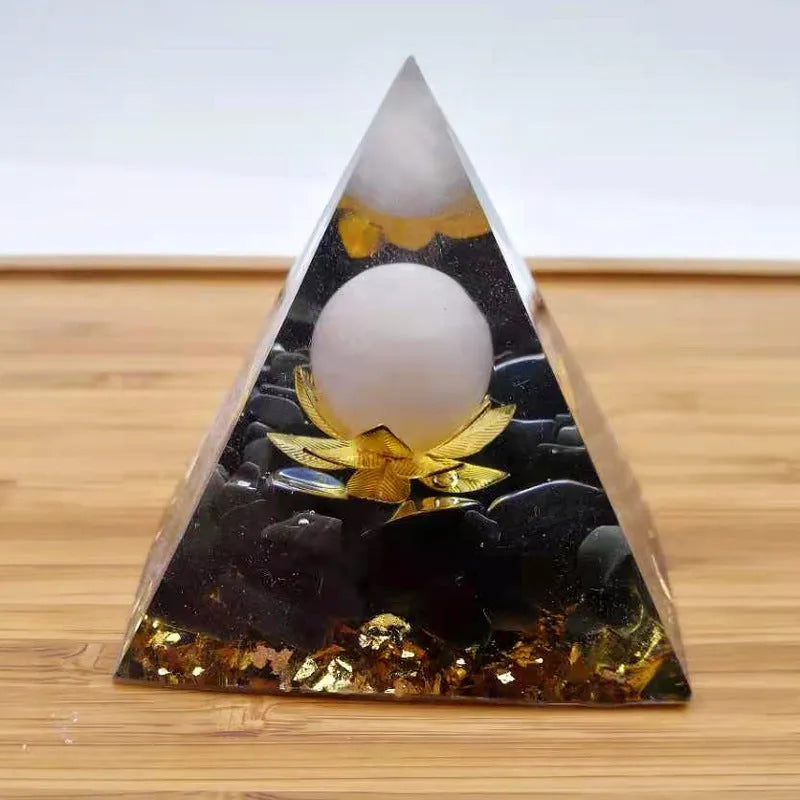 Black resin pyramid ornament measuring 60 x 60 mm on a white background
