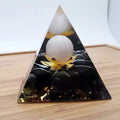 Black resin pyramid ornament measuring 60 x 60 mm on a white background