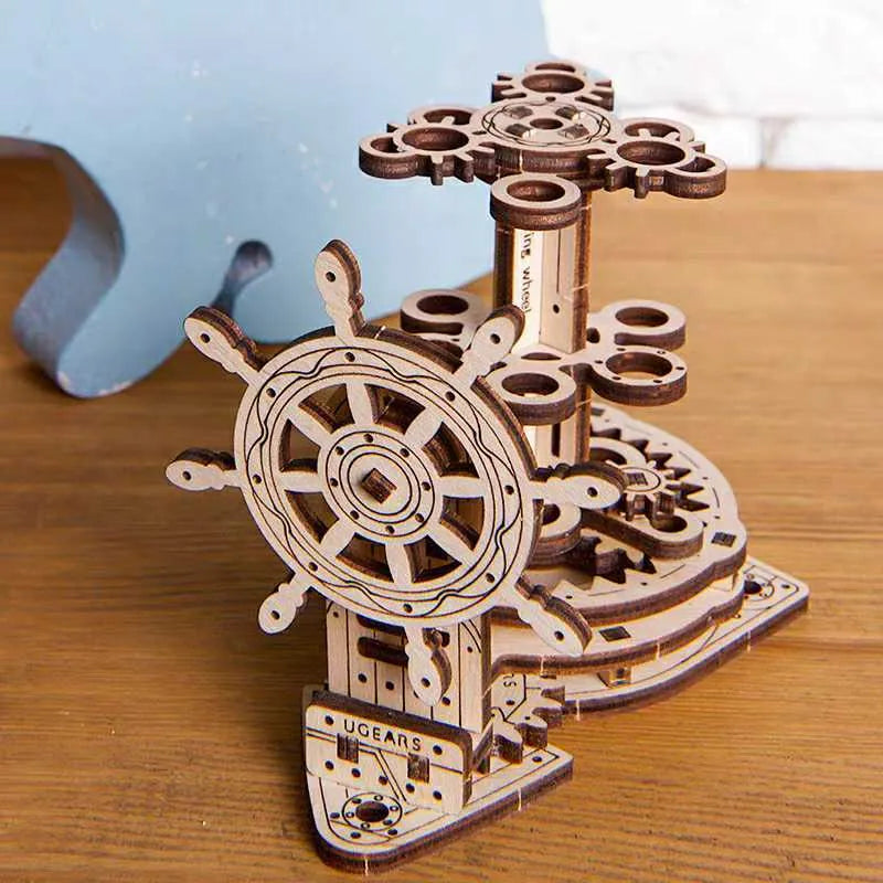 Ukrainian wooden rotating pen holder assembly kit showing photo colour finished model.