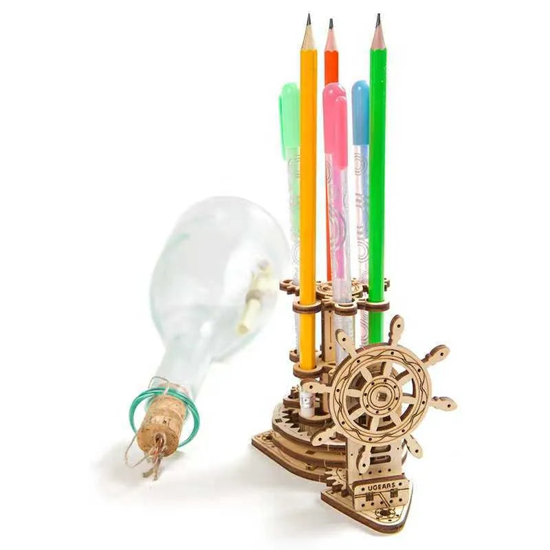 Ukrainian wooden rotating pen holder assembly kit showing photo colour finished model.