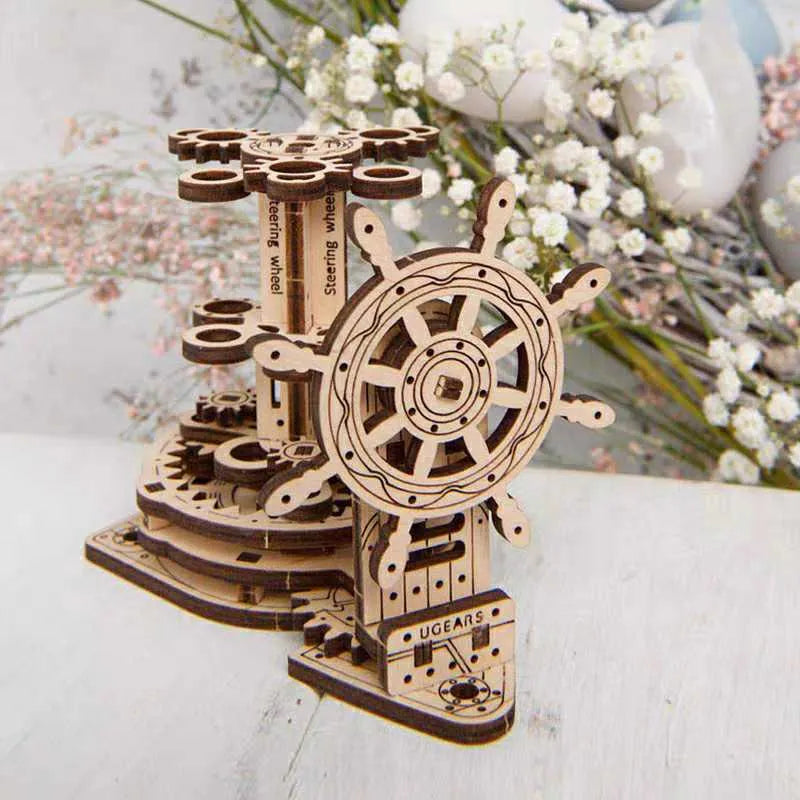 Ukrainian wooden rotating pen holder assembly kit showing photo colour finished model.
