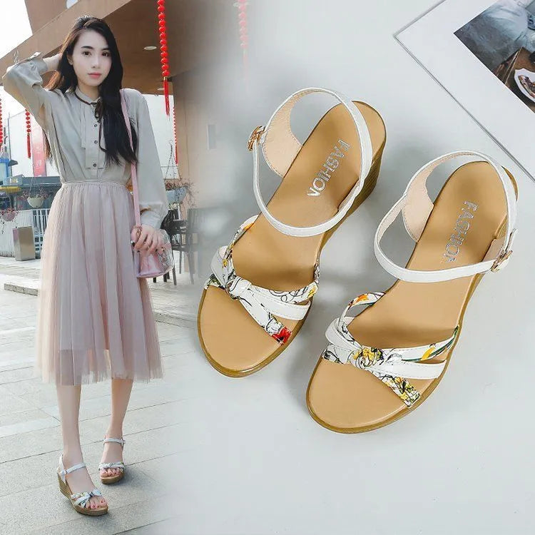 Women's pink PU wedge sandals with a thick heel, fish mouth design, and an adjustable buckle.