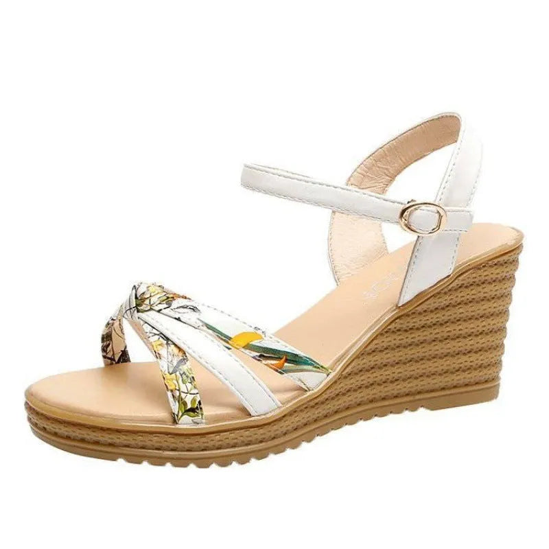 Women's pink PU wedge sandals with a thick heel, fish mouth design, and an adjustable buckle.