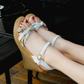 Women's pink PU wedge sandals with a thick heel, fish mouth design, and an adjustable buckle.