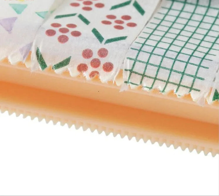 Fante plastic tape cutter storage box in beige with tape roll visible, compact Japanese-style design
