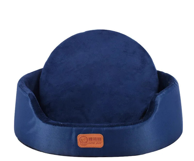 Four Seasons washable pet bed with sponge oval fossa in navy colour placed on floor