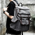 Men's retro canvas backpack in grey with colour-contrast design, large 20L capacity, soft handle, and zipper pocket