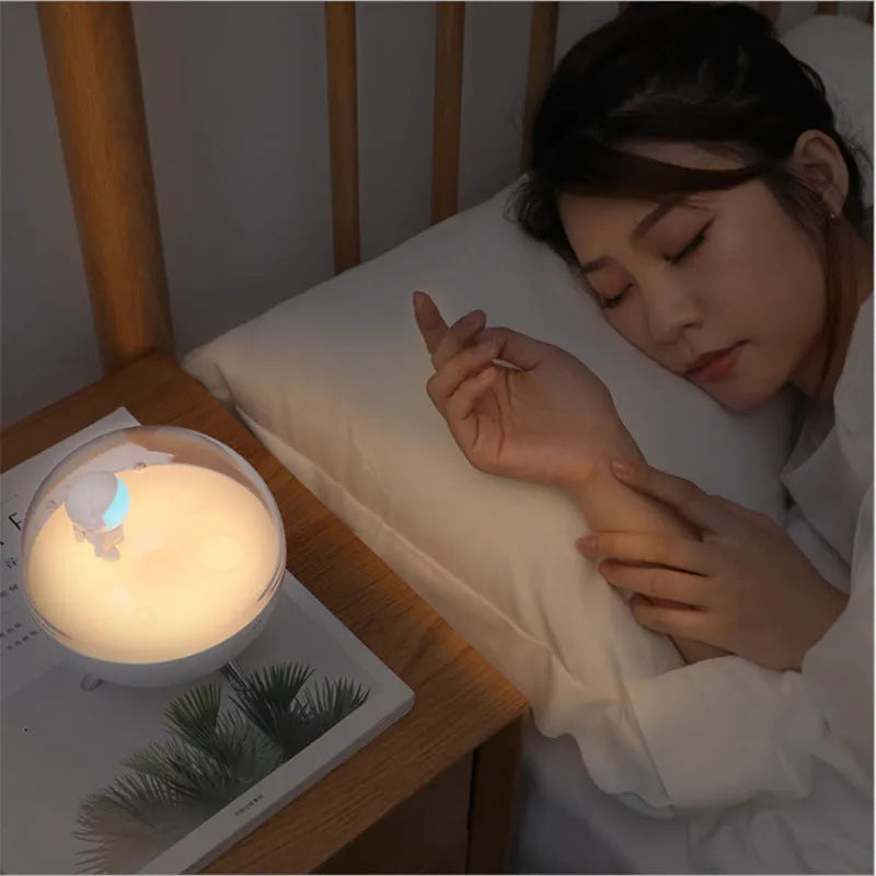 USB-powered cartoon night light with plastic shade showing blue or white LED illumination options