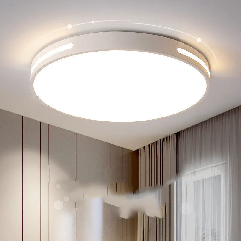 Round white LED ceiling lamp with acrylic shade and remote control for bedroom lighting