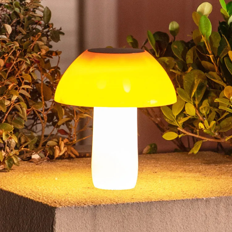 Single solar-powered mushroom garden light with ground spike in white or warm light.