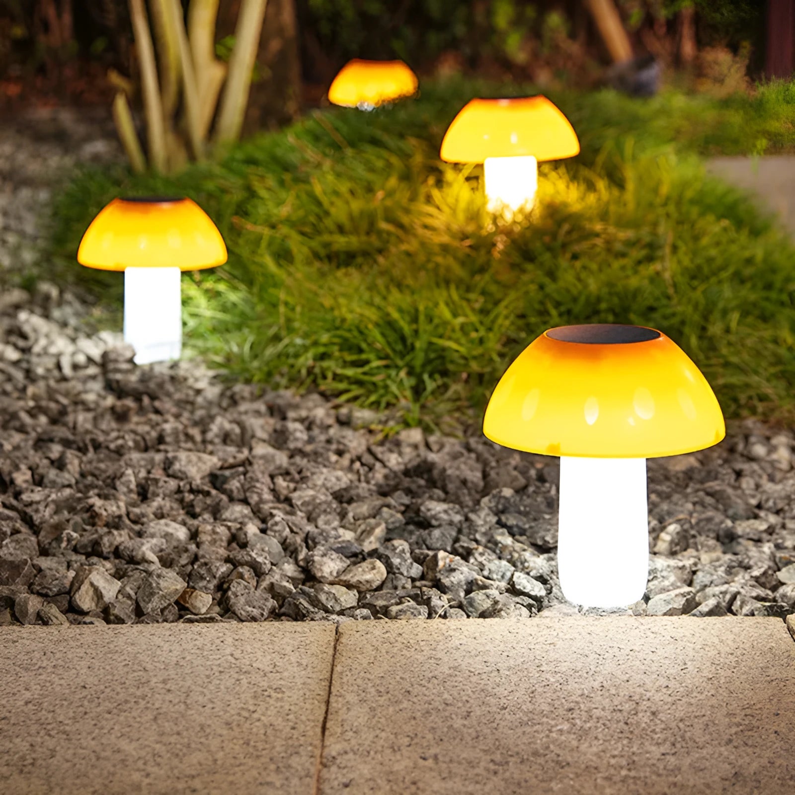Single solar-powered mushroom garden light with ground spike in white or warm light.