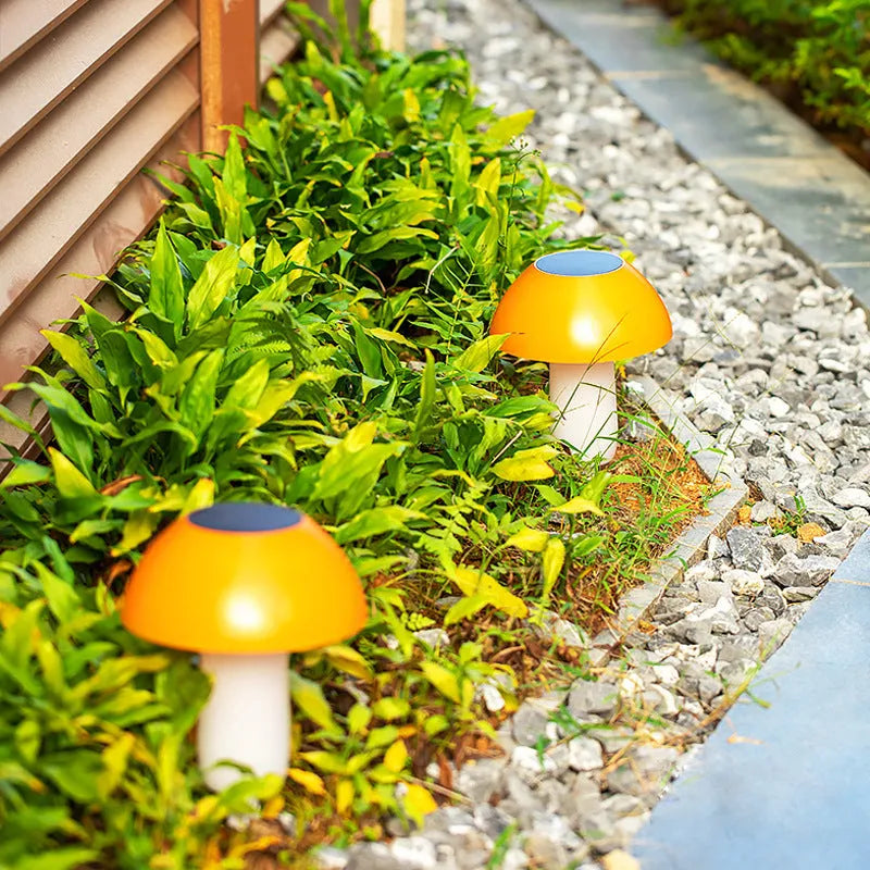 Single solar-powered mushroom garden light with ground spike in white or warm light.