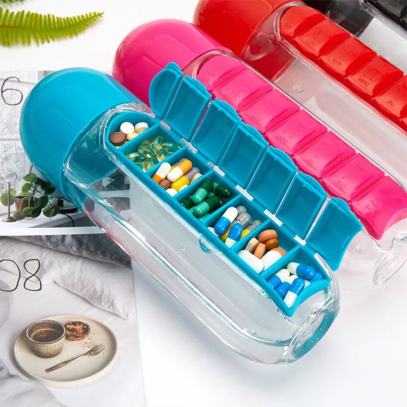 Plastic water bottle with built-in 7 day pillbox organizer in black colour