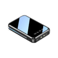 White mini power bank with digital display showing battery percentage, featuring two USB ports