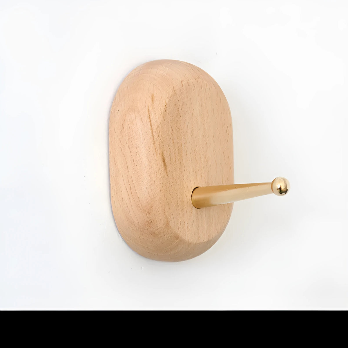 Beech wood adhesive wall hook in brass finish with 10kg capacity and geometric shape options