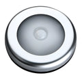 Silver circular battery-powered motion sensor night light with a white PC plastic lampshade.
