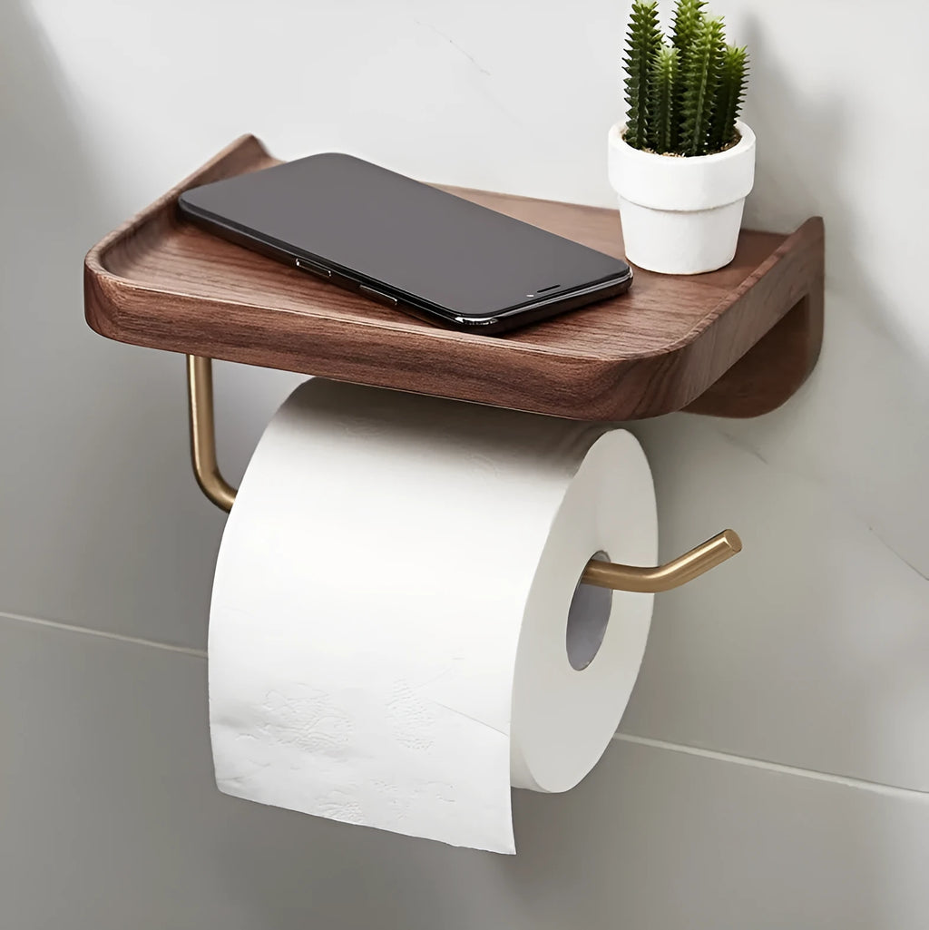 Solid walnut wood wall-mounted paper towel holder with brass fittings.