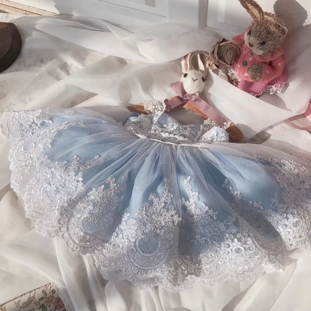 Ocean blue baby girl princess dress with lace details for birthday parties.