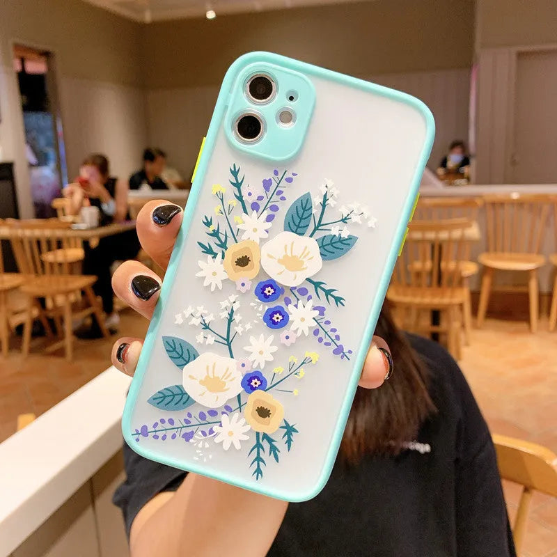 iPhone case with cartoon floral design and contrasting colour matte frame in pink lavender.