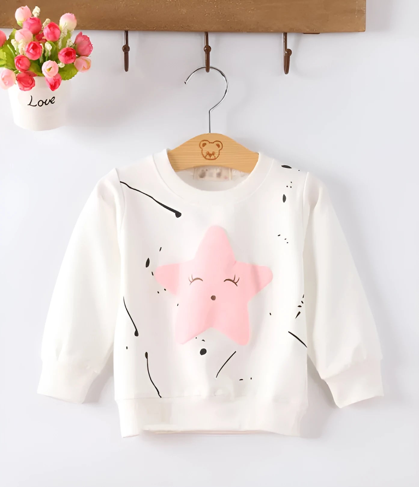 Baby girl's Korean-style cartoon print knitted sweater for autumn in assorted colours.