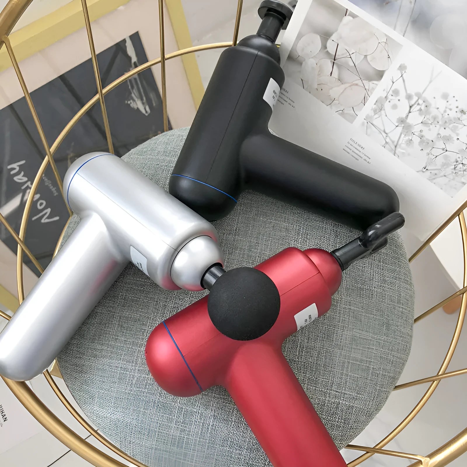 Black handheld fascia gun muscle massager with USB charging port