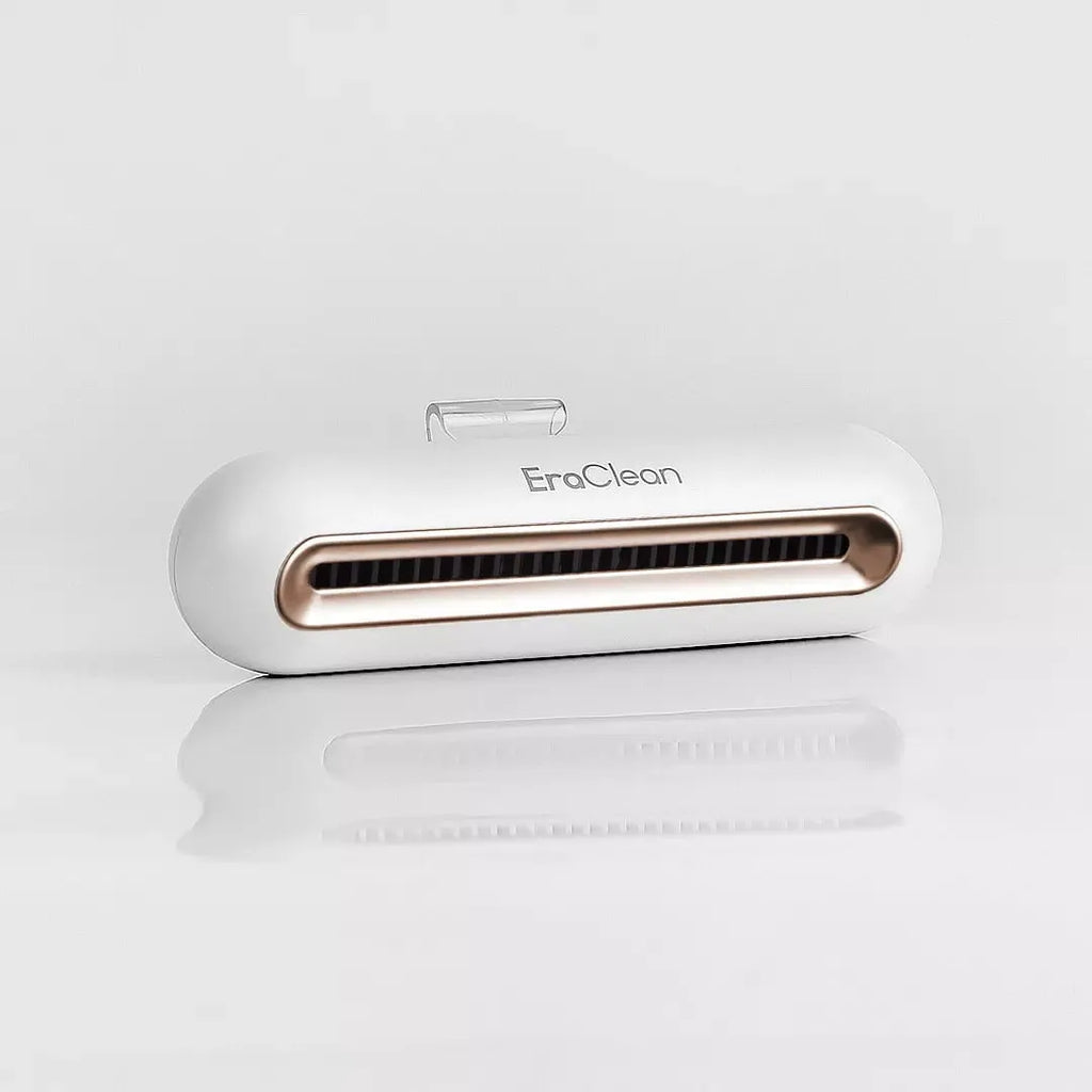 Rose gold car refrigerator deodorant steriliser with USB port and push-button controls
