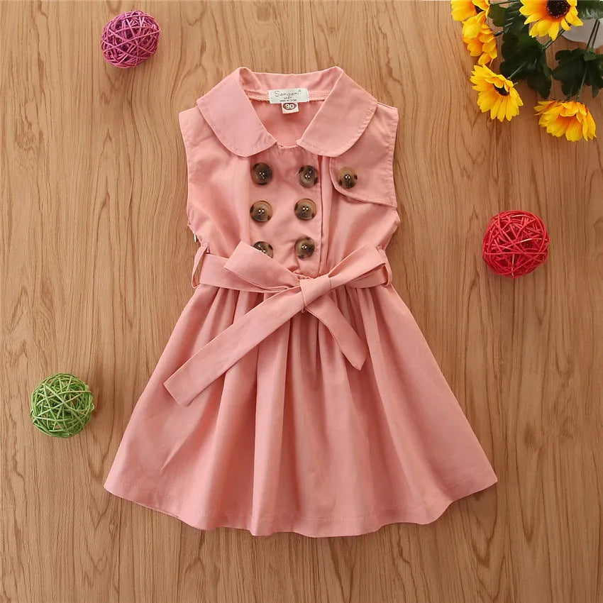 A sleeveless pink A-line princess dress for a toddler girl with a sash and button fastening.