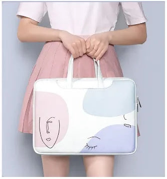 Blue waterproof PU leather laptop bag for 15.6 inch notebooks with a zip and soft handle.