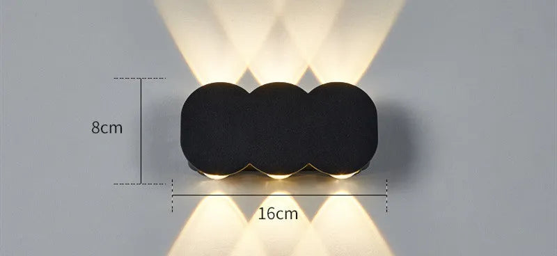 Modern minimalist waterproof LED wall light for indoor and outdoor installation with clean design
