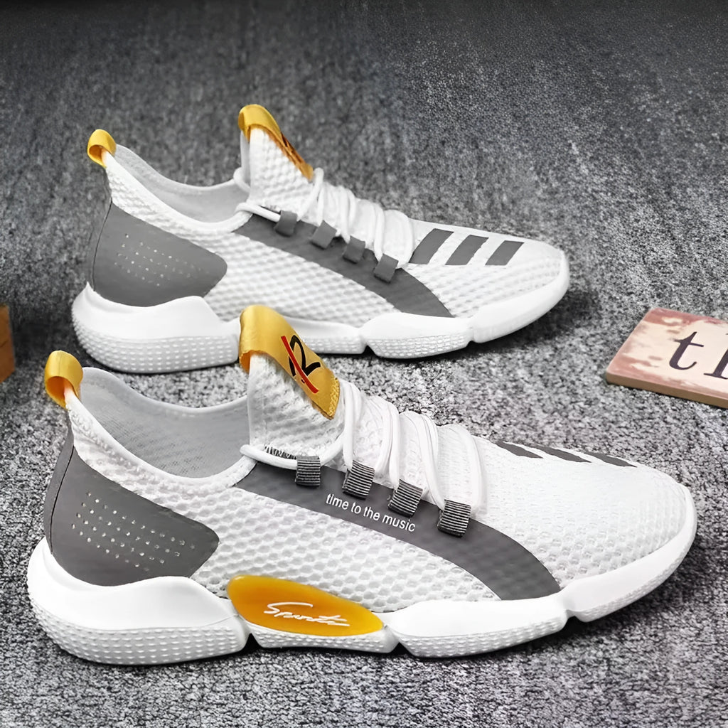Men's breathable mesh lace-up casual sneakers in black with car suture detail and low heel
