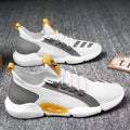 Men's breathable mesh lace-up casual sneakers in black with car suture detail and low heel