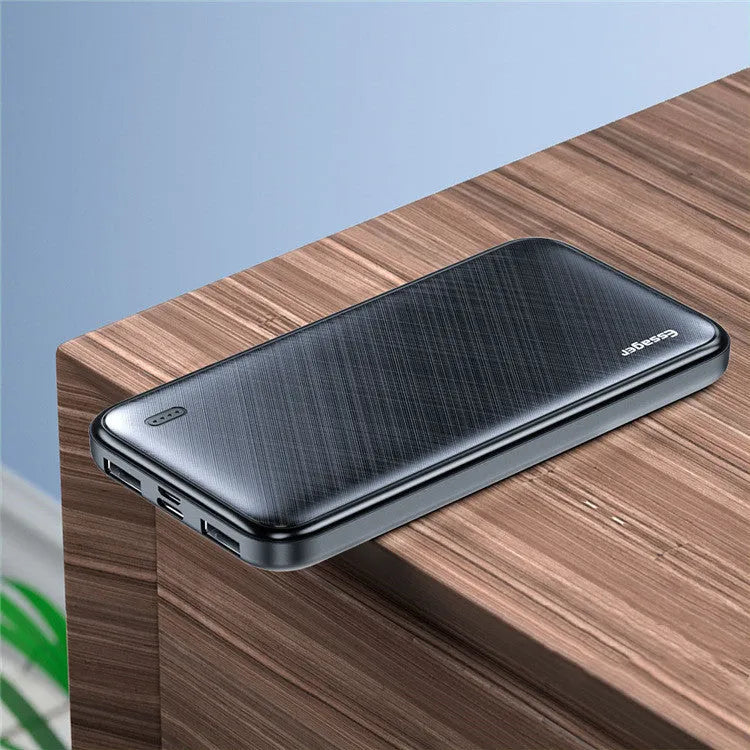 Essager portable power bank with 10000mAh capacity in black colour on a surface