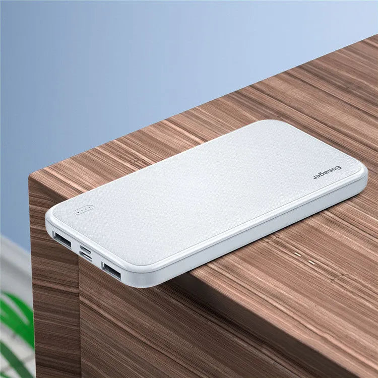 Essager portable power bank with 10000mAh capacity in black colour on a surface