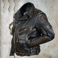 Black faux leather multi pocket zipper jacket on display, front view, non-hooded design