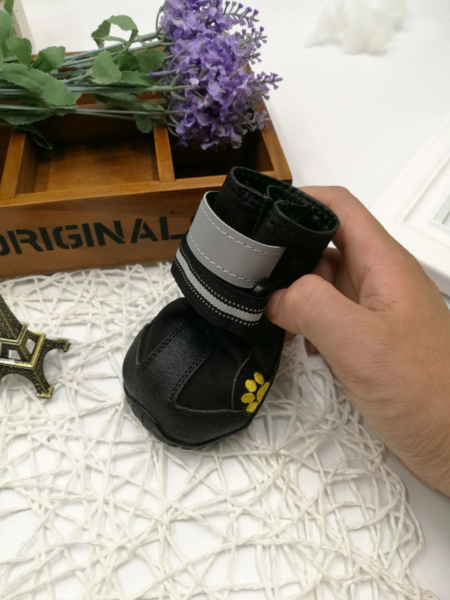 Black waterproof dog shoes with non-slip PVC sole, adjustable fuzzy belt