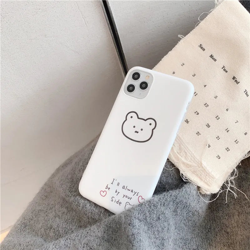 Soft silicone iPhone case featuring a cartoon bear design in Korean style colours.
