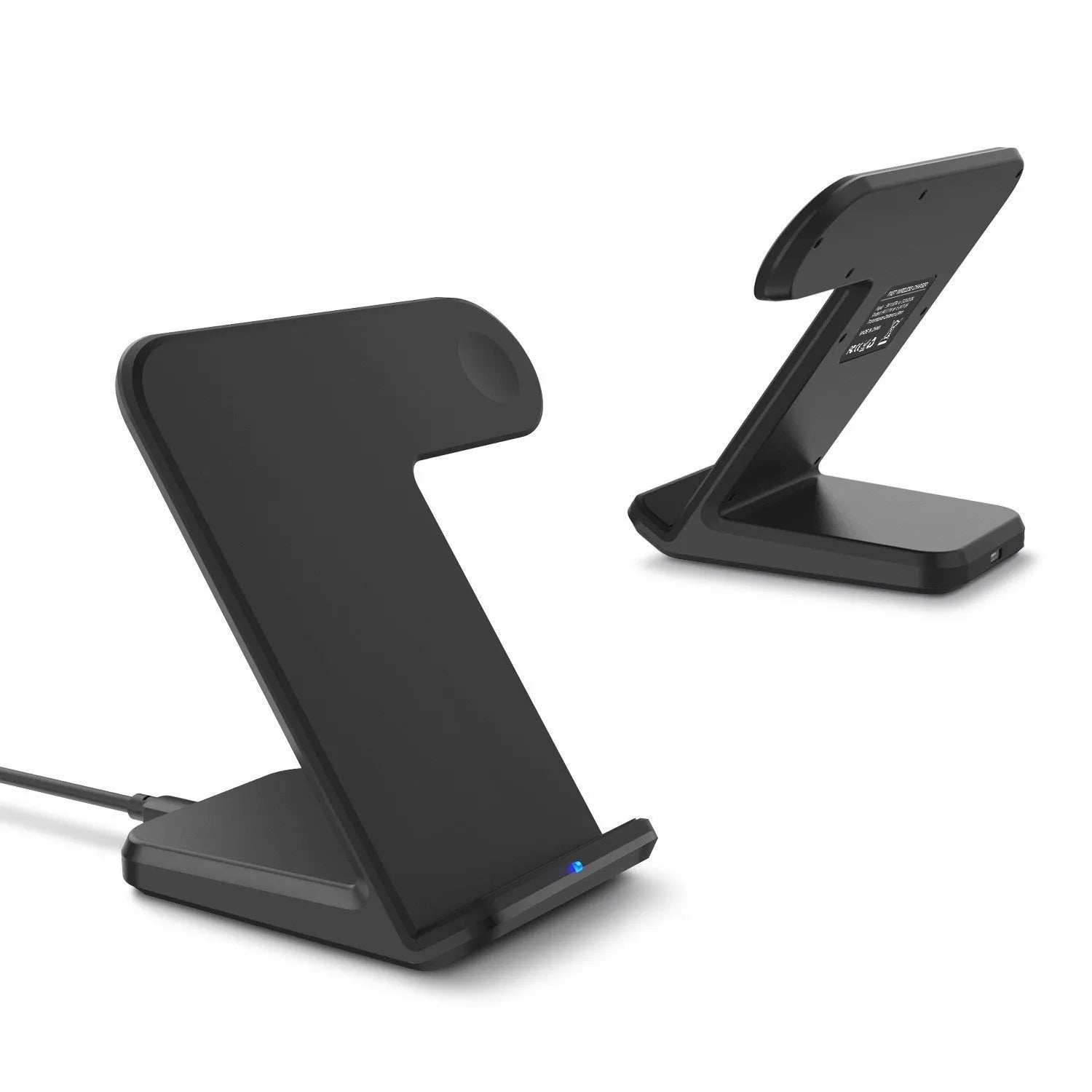 Black and white wireless fast charging pad for mobile phones on a desk