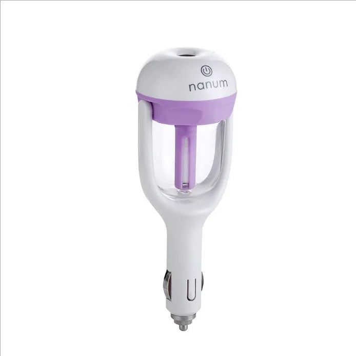 Blue portable car humidifier with essential oil diffuser function on car dashboard