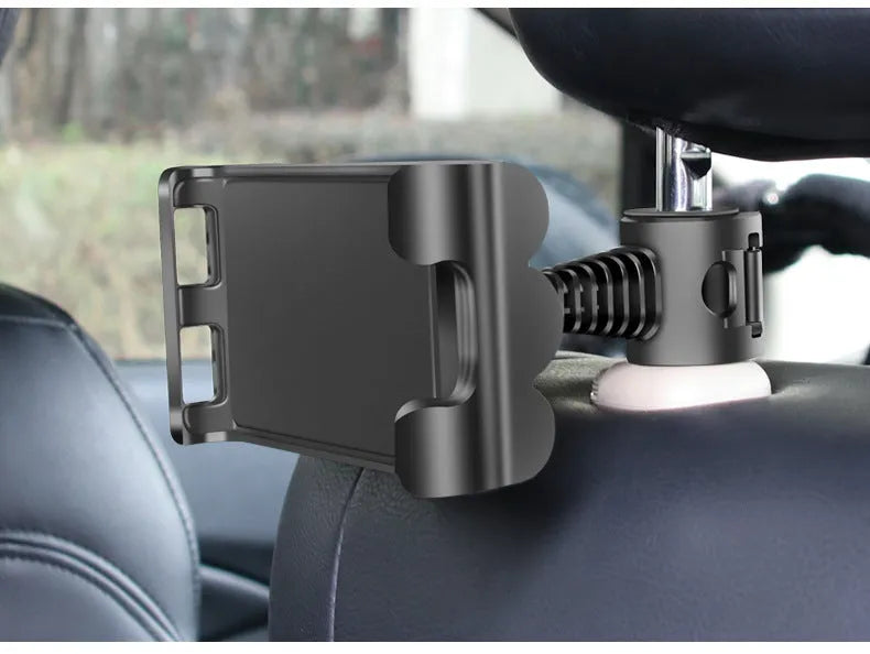 Black universal car headrest tablet holder mounted on a seat, showing 360-degree rotation and extended arm.