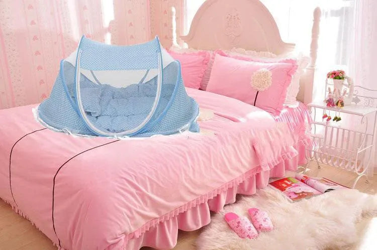 Foldable baby bed net 110x65x60cm with mattress and pillow in blue or pink mesh and steel wire frame